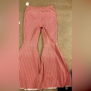 Free People- Stylish Wide Leg Red & White Striped pants. Heart shaped pockets.